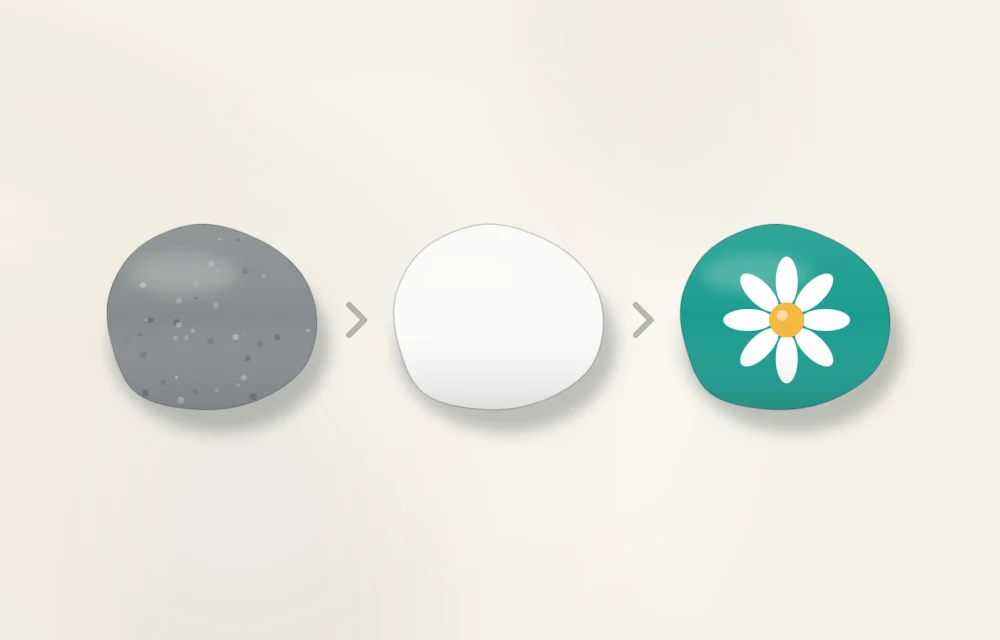 One stone in three stages from left to right: bare gray stone, the same stone with a white base coat, and the finished stone with a simple daisy